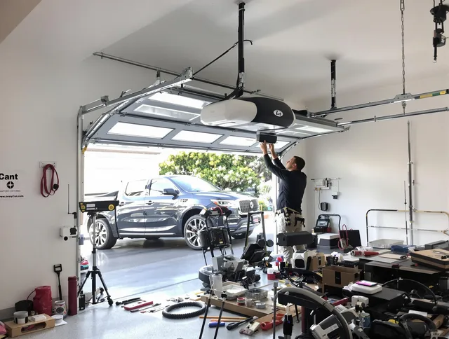 Wickliffe Garage Door Repair specialist installing smart garage door opener system in Wickliffe home