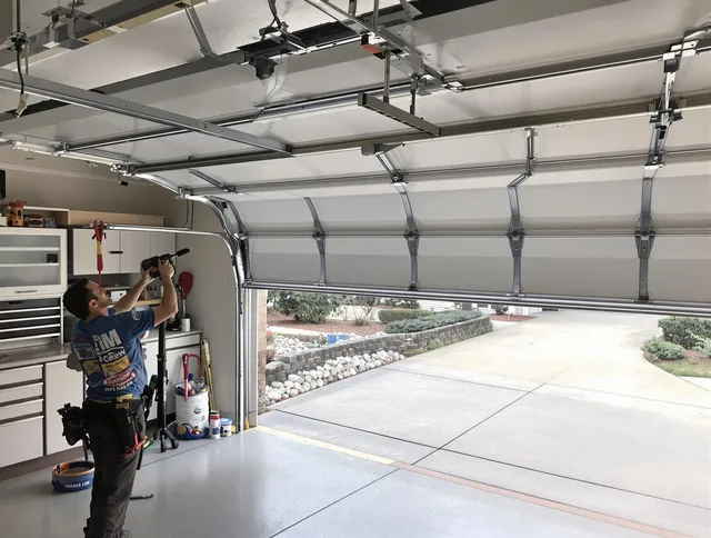 Garage door track repair service by Wickliffe Garage Door Repair in Wickliffe